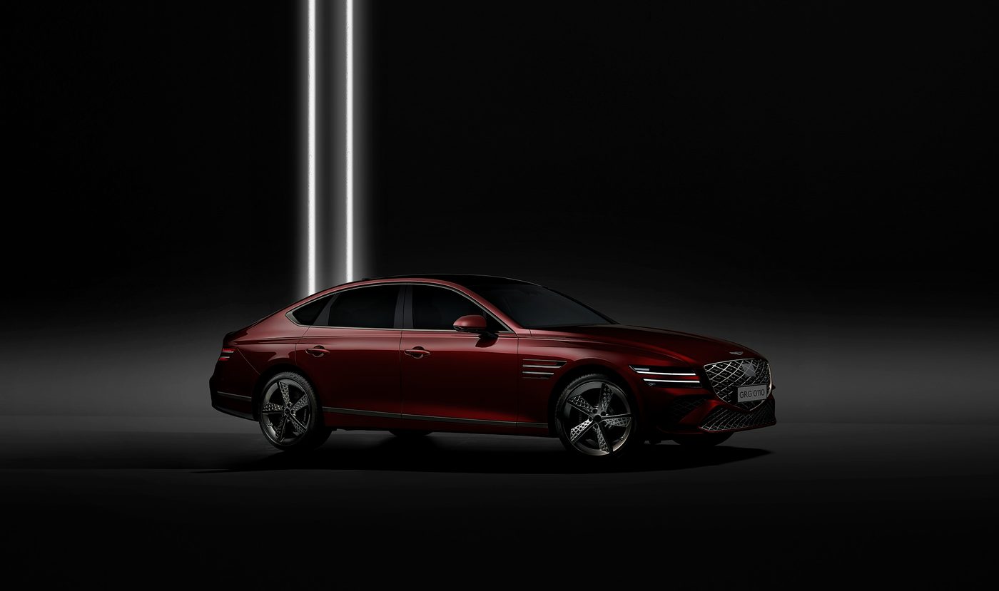 A saloon in deep red gloss film under a single studio strip light