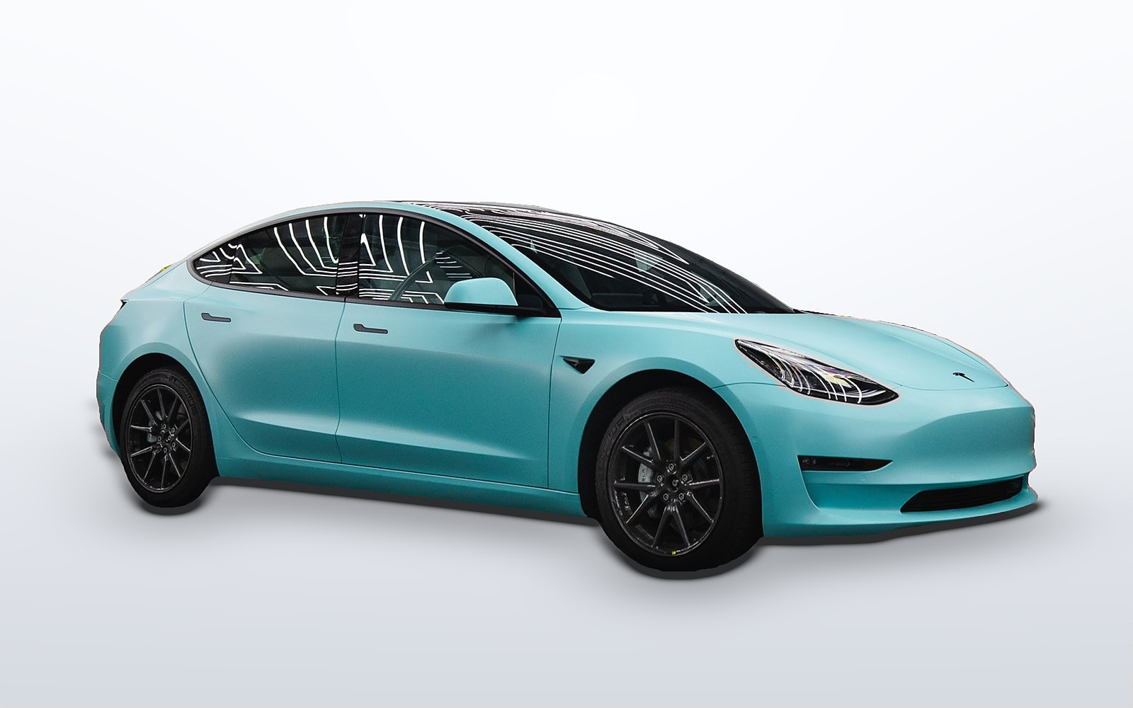 A Model 3 shown in the selected wrap colour
